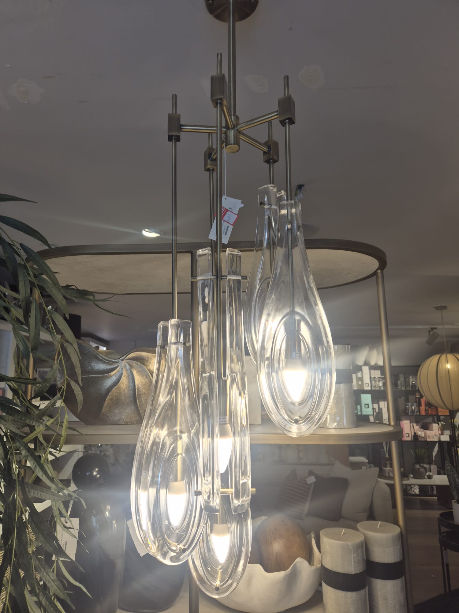Glass pendant cluster hung and wired to height.