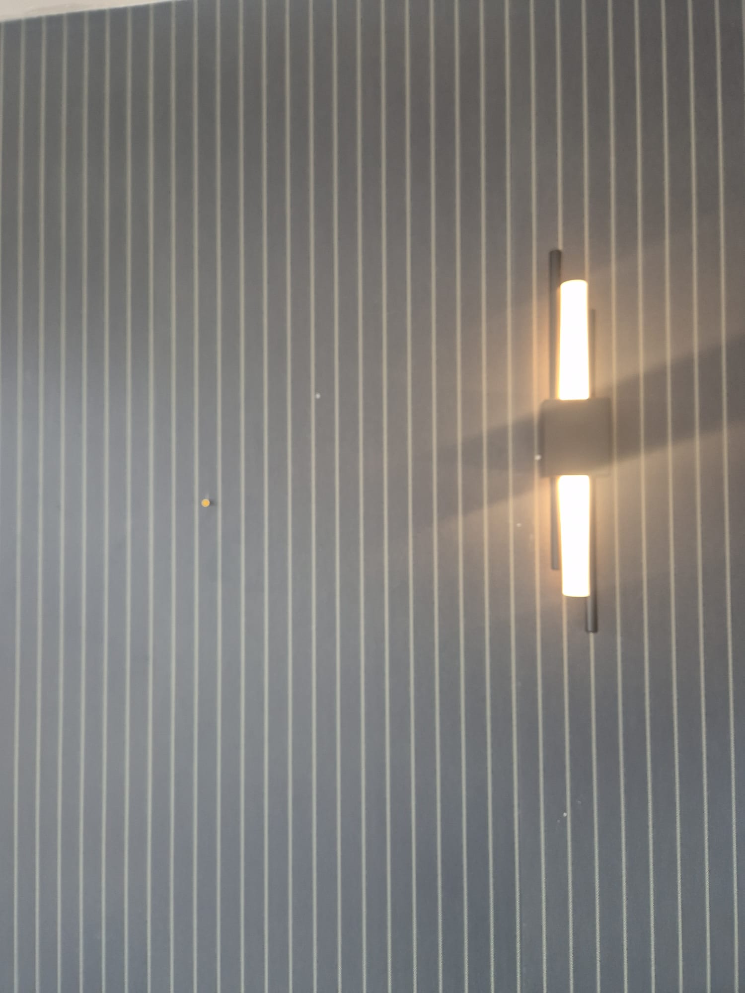 Same wall light with the cable run kept concealed.