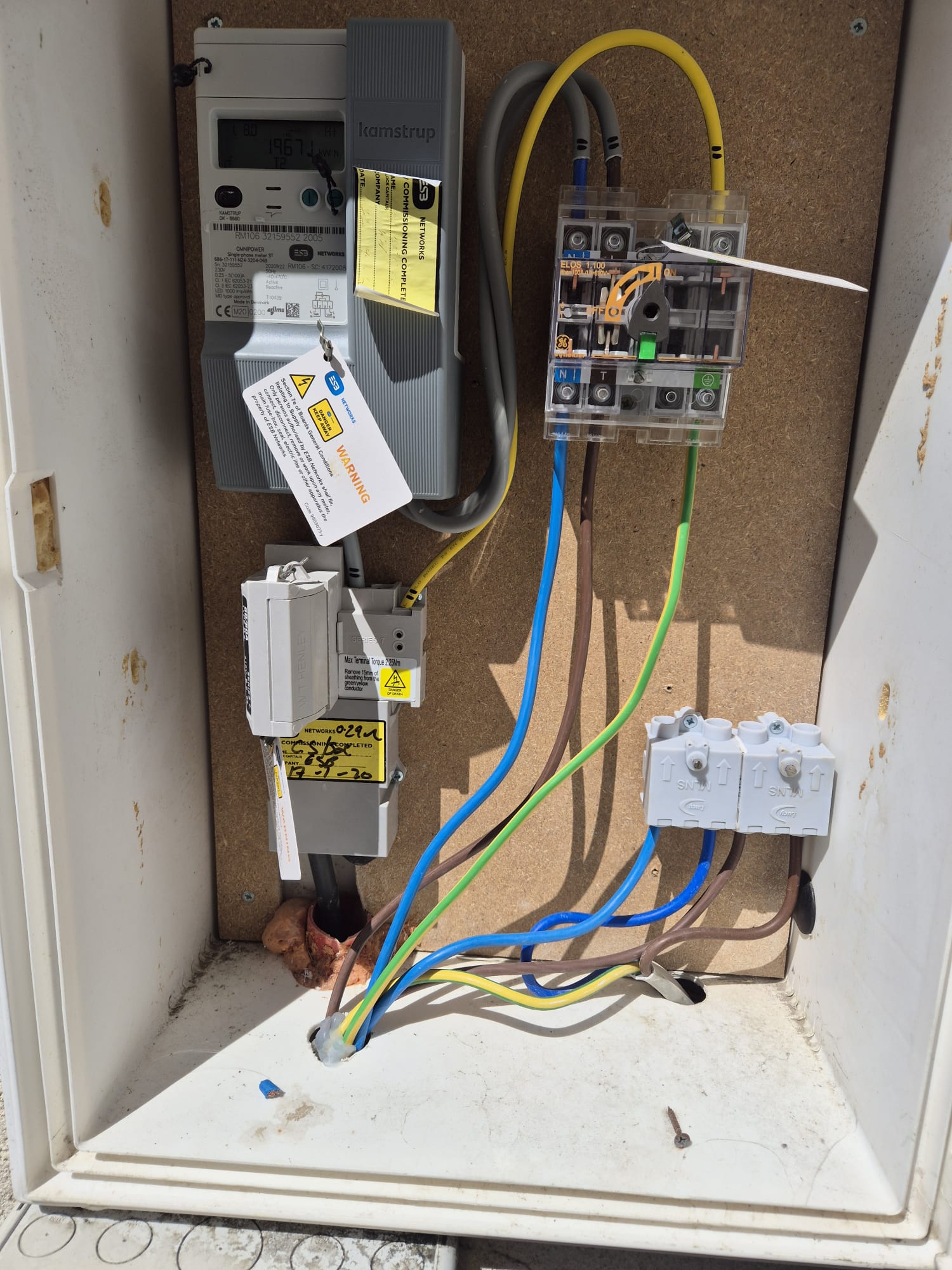 Meter box isolator and main tails wired and terminated.