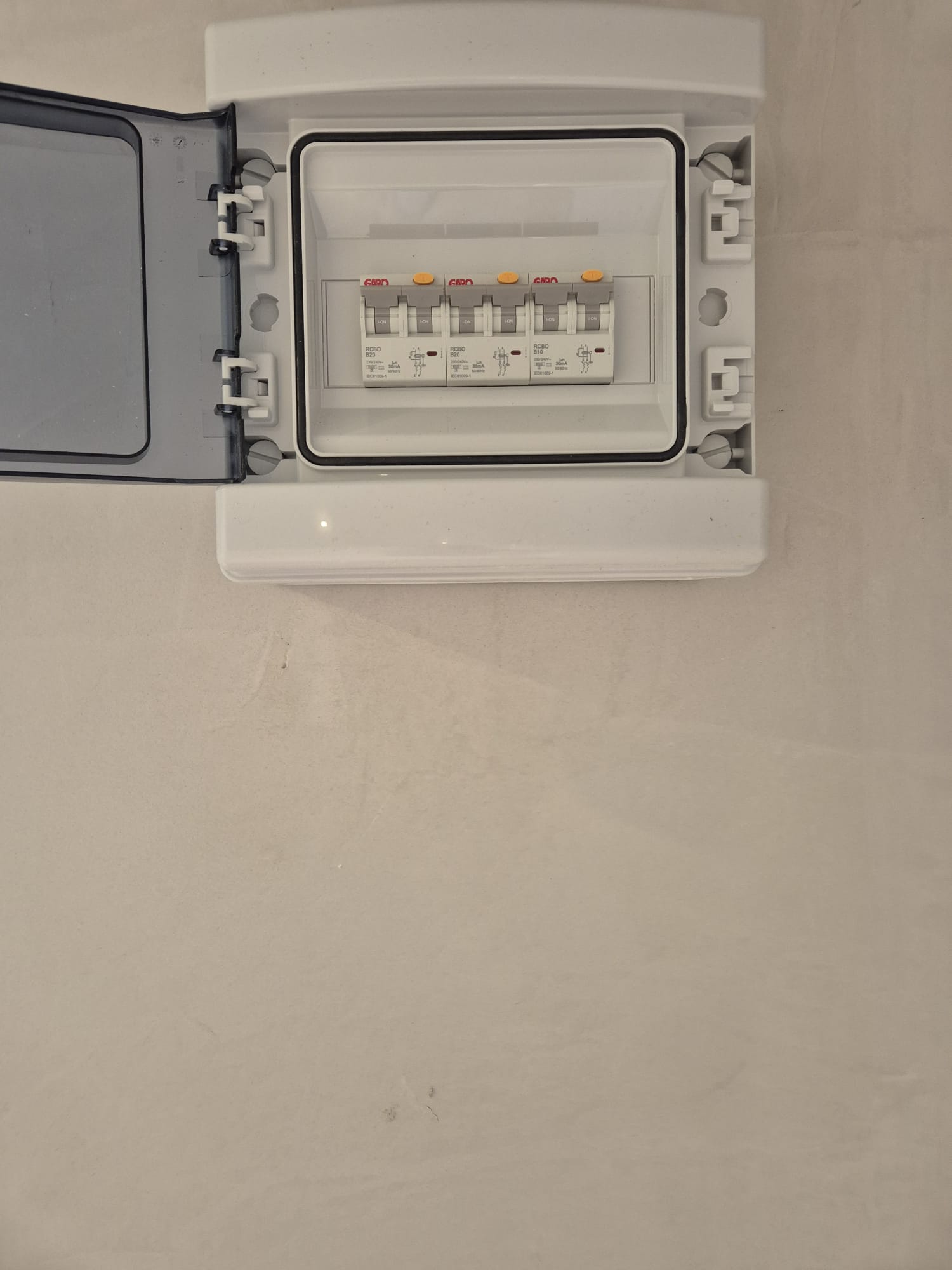 Small consumer unit with RCBOs fitted for an outbuilding supply.